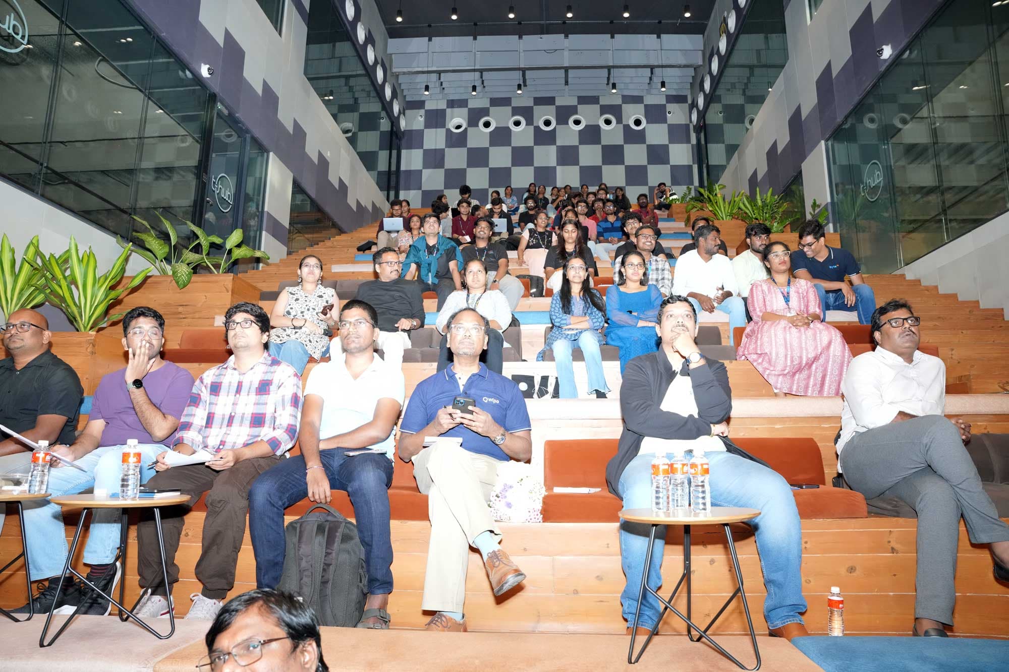 The audience watching the finale presentations