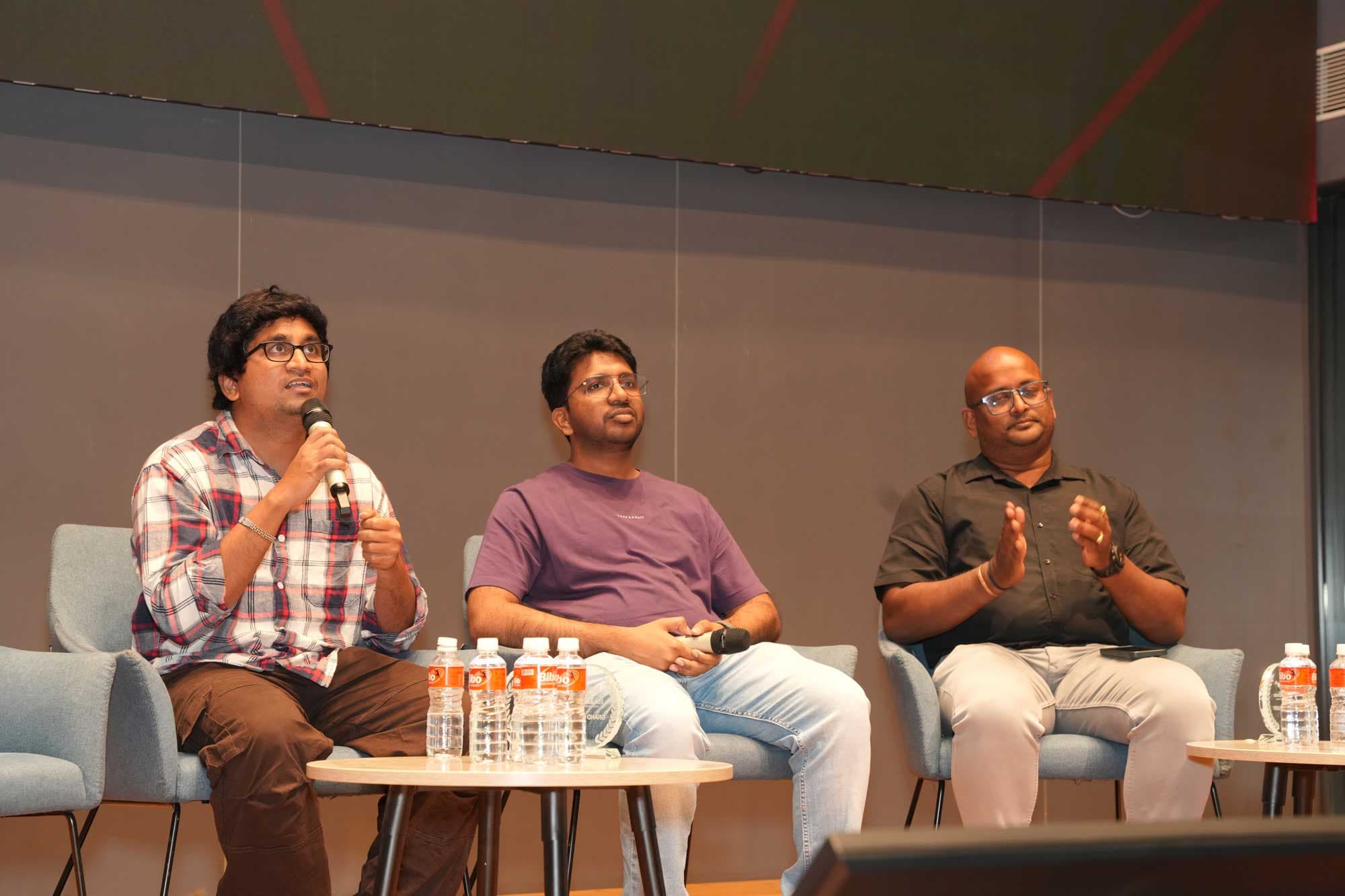 Industry speakers in a panel discussion